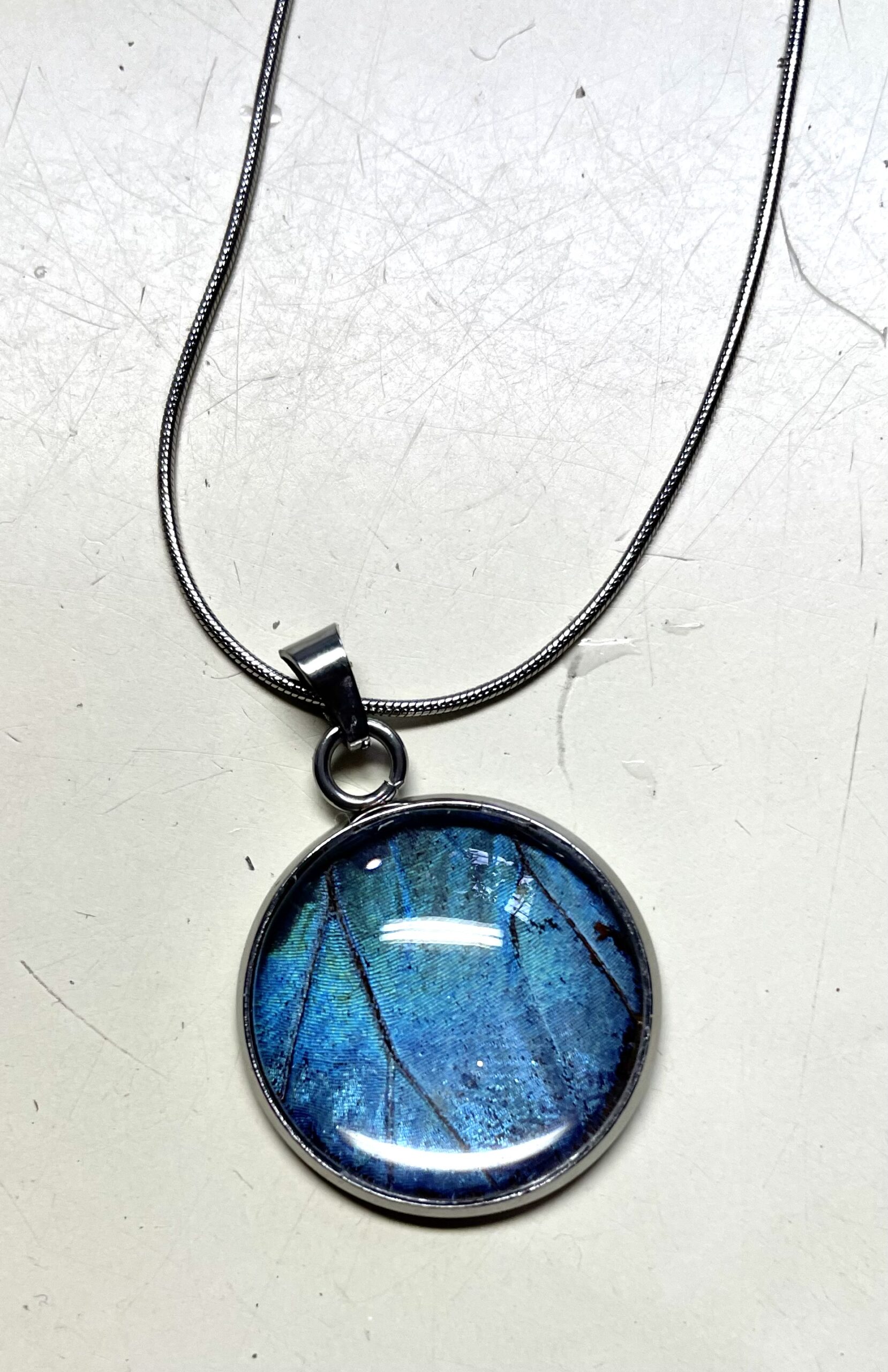 Stainless Steel Glass Blue Morpho necklace